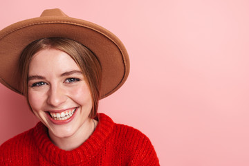 Photo of happy beautiful woman in hat laughing and looking at camera