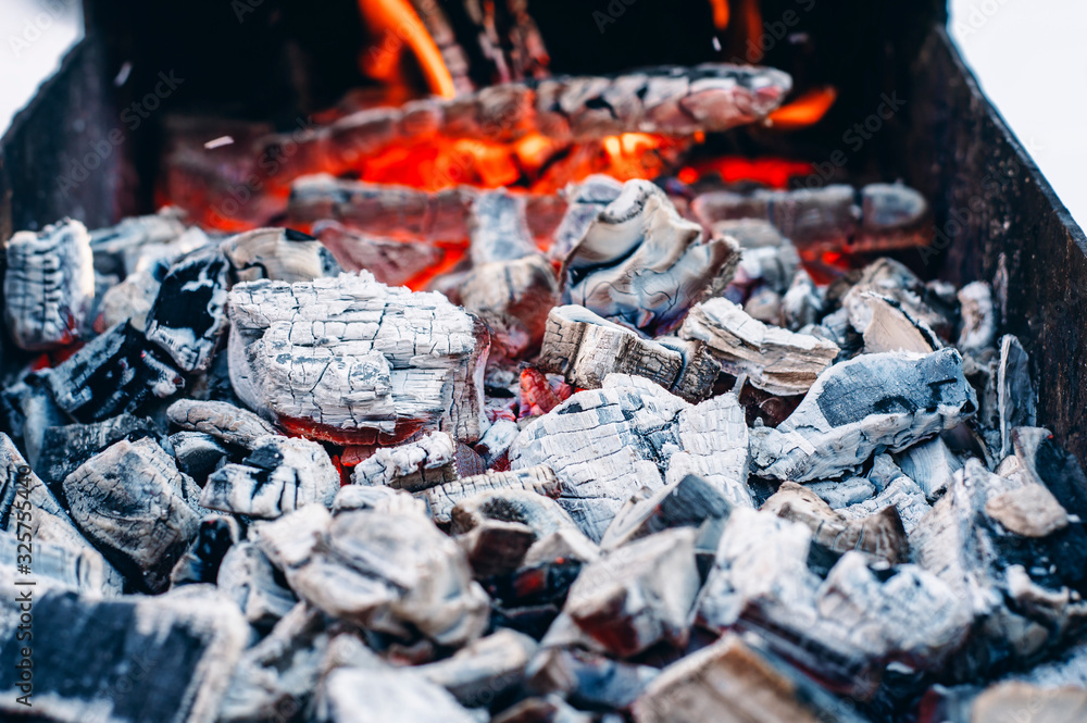 Wall mural background image of fire and hot coals in close-up.