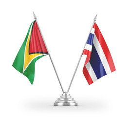 Thailand and Guyana table flags isolated on white 3D rendering