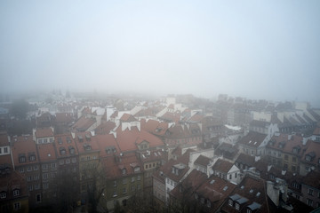 Aerial view of the Warsaw Historic Center in fog.