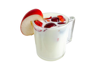 Kefir with apple and cherry strawberries in a glass on a white background.