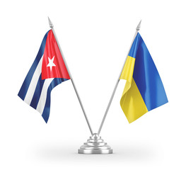 Ukraine and Cuba table flags isolated on white 3D rendering