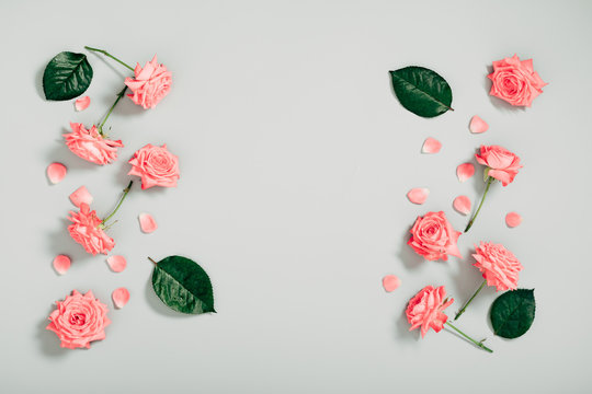 Beautiful flowers composition. Pink rose flowers on gray background. Valentines Day, Easter, Birthday, Happy Women's Day, Mother's day. Flat lay, top view, copy space