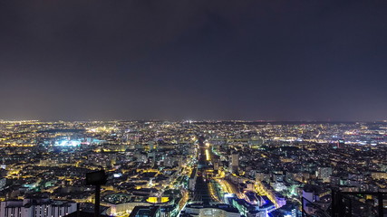 The city skyline at night. Paris, France. Taken from the tour Montparnasse timelapse