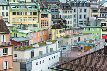 Rooftops and facades in Lausanne, Switzerland on an overcast day
