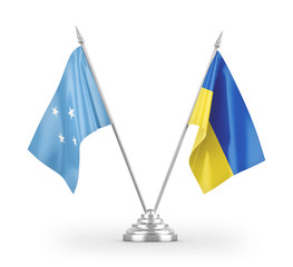 Ukraine and Micronesia table flags isolated on white 3D rendering