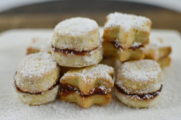 Serbian traditional homemade vanilla cookies(vanilice) with jam and powdered sugar