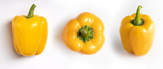 fresh organic yellow peppers isolated on white background. Delicious yellow bell pepper is from the same plant that produces red and green bell peppers.
