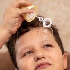 Soap bubble in the hand.