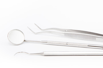 Basic dentist tools isolated on white