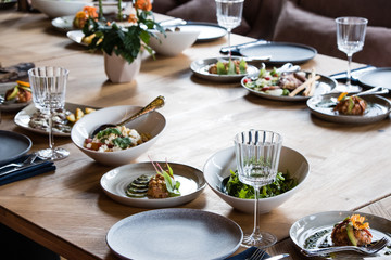 Served for banquet restaurant table with dishes, snack, wine glasses