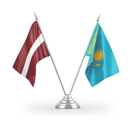 Kazakhstan and Latvia table flags isolated on white 3D rendering