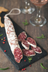Fuet sausage with spices and herbs
