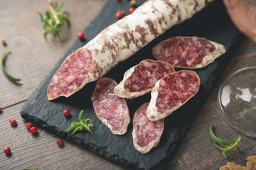 Fuet sausage with spices and herbs