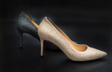 shiny stiletto on black female shoes