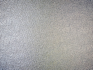 Grunge texture, frosted glass distressed silver effect with lighting back side.