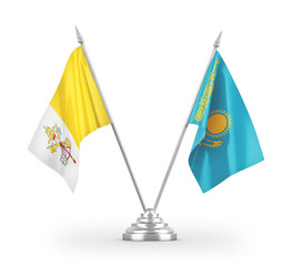 Kazakhstan and Vatican table flags isolated on white 3D rendering