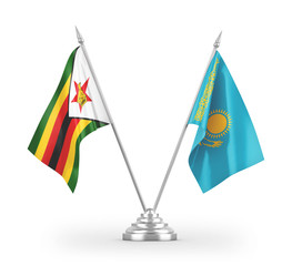 Kazakhstan and Zimbabwe table flags isolated on white 3D rendering