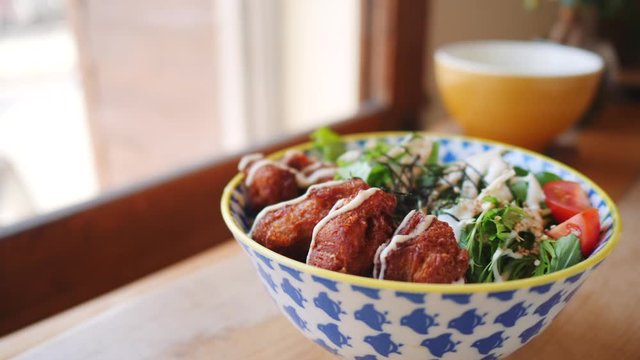 Close Up Of Hand Picking Soy Meat From Buddha Bowl With Chopsticks. Vegan Food Concept. 4K Footage.