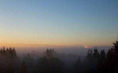 Fototapeta na wymiar Morning sun and fog