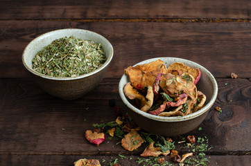 Dried fruits and medicinal herbs in bowls