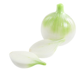 Onion vegetable and onion slices isolated on white background, close up.