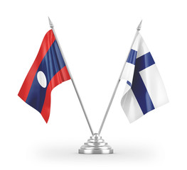 Finland and Laos table flags isolated on white 3D rendering.