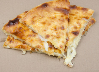 Khachapuri in Georgian. Khachapuri with cheese. Georgian traditional tortillas.