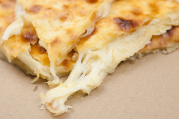 Khachapuri in Georgian. Khachapuri with cheese. Georgian traditional tortillas.