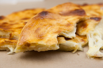 Khachapuri in Georgian. Khachapuri with cheese. Georgian traditional tortillas.