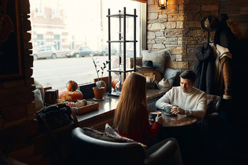 young family having breakfast in the cafe, copy space, love, relationship, affection,man and woman solving problems