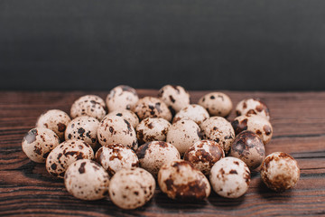quail eggs on wooden background