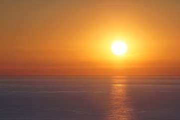 Sun sets over the sea in Versilia