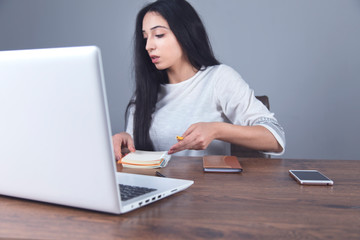 woman hand notepad with computer