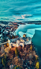Beautiful panoramic aerial drone view to the Niedzica Castle also known as Dunajec Castle, located in the southernmost part of Poland in Niedzica, Nowy Targ County, Dunajec River, Lake Czorsztyn
