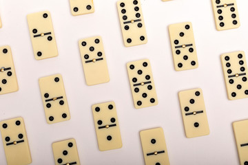Photo of different dominoes. Background of dominoes. Hobbies collecting on white background.