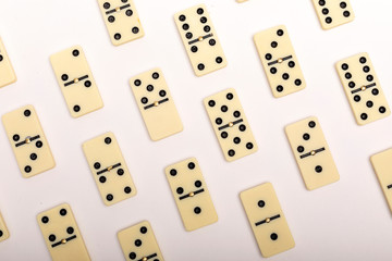 Photo of different dominoes. Background of dominoes. Hobbies collecting on white background.
