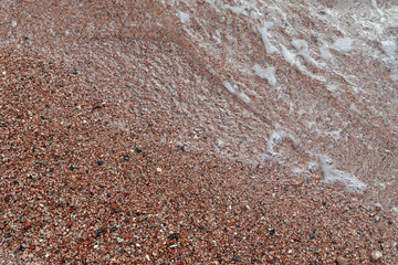 Red Sand and Stones of the red Sea Coast, Natural Texture Background