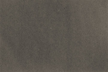 Kraft paper texture. Vintage gray black sheet of paper. Copy space