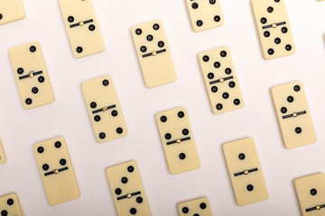 Photo of different dominoes. Background of dominoes. Hobbies collecting on white background.
