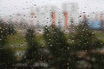 The view from the window in rainy weather on the streets of the city.