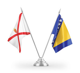 Bosnia and Herzegovina and Jersey table flags isolated on white 3D rendering