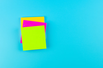 Empty paper note on blue background with copy space for text. FAQ( frequency asked questions), Answer, Q&A, Communication and Brainstorming, International Ask a Question day Concepts