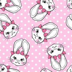 Seamless pattern with cute bunny girl on polka dot background.