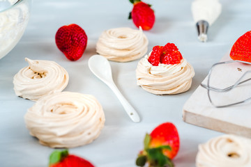 Anna Pavlova cake with strawberry. Close up.