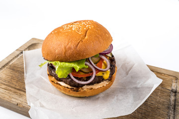 Craft beef burgers with vegetables. Copy space for your text