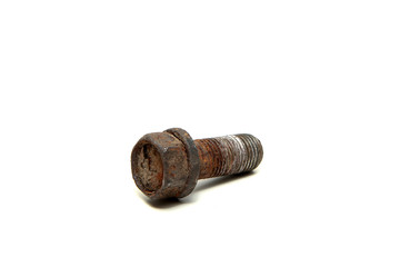 A single old and rusty screw isolated on a white background. 