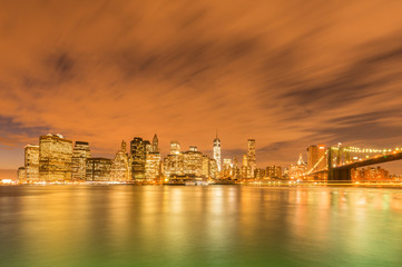 Fototapeta na wymiar Night view of Manhattan and Brooklyn bridge