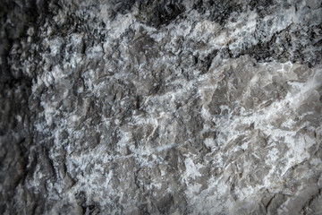 Dark textured stone surface