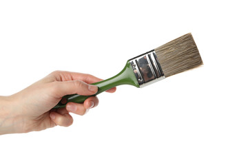 Female hand hold paint brush, isolated on white background